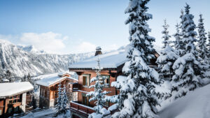 Sun on a mountain Courchevel village in the French Alps in winte