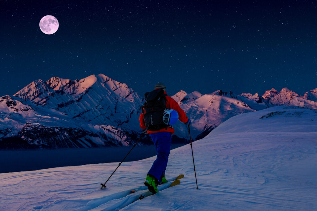 Skiing in the moonlight, looking towards Mont Fort