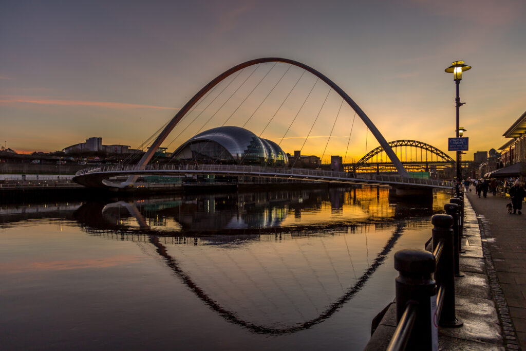 Newcastle’s Millennium Bridge reflects onto the River Tyne
