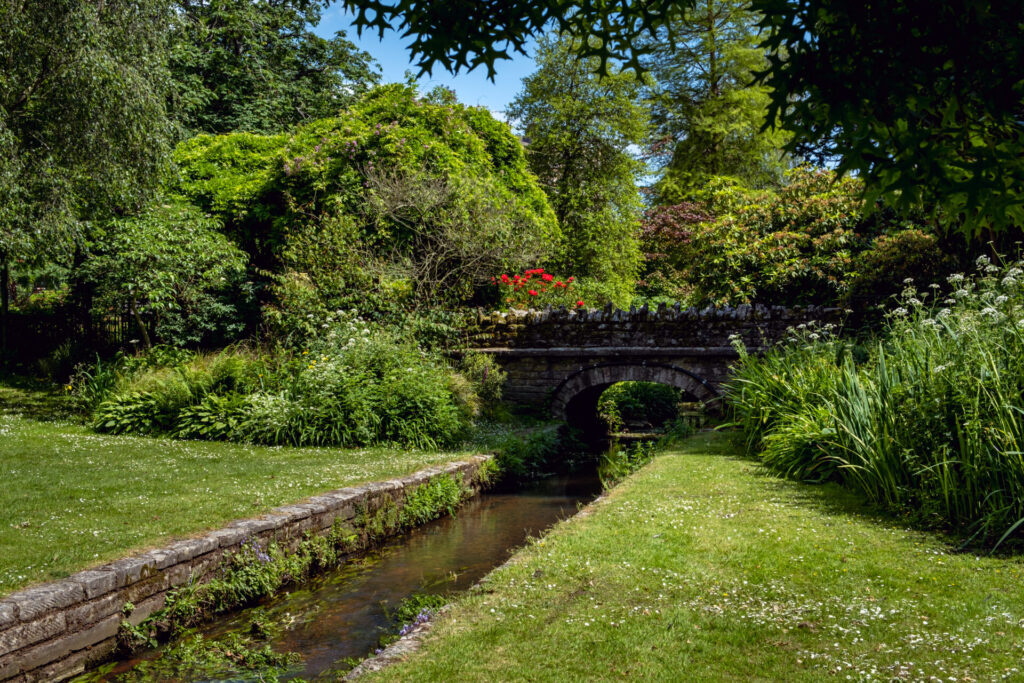 The Bourne Stream in the Middle Gardens leading to the Lower Gardens in Bournemouth Dorset, England.